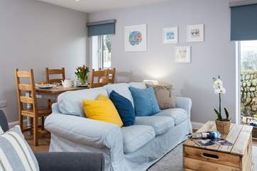 The super comfy sofa is the perfect spot to read a book.