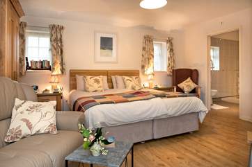 The super-king size bed can either be made up as shown or as twin beds, providing great flexibility.