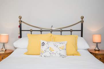 The spacious master bedroom is situated to the front of the property