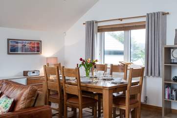 The dining-table has oodles of space and is perfect for long lazy lunches.