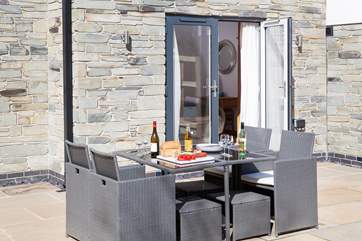 The patio is the perfect spot for a chilled glass of wine, after a busy day on the beach.