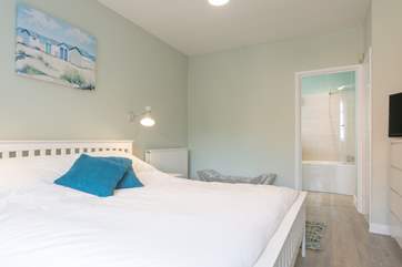 The master bedroom is on the ground floor with a very generous super-king size bed.