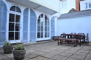 Enjoy the outside patio area located off the shared pathway.