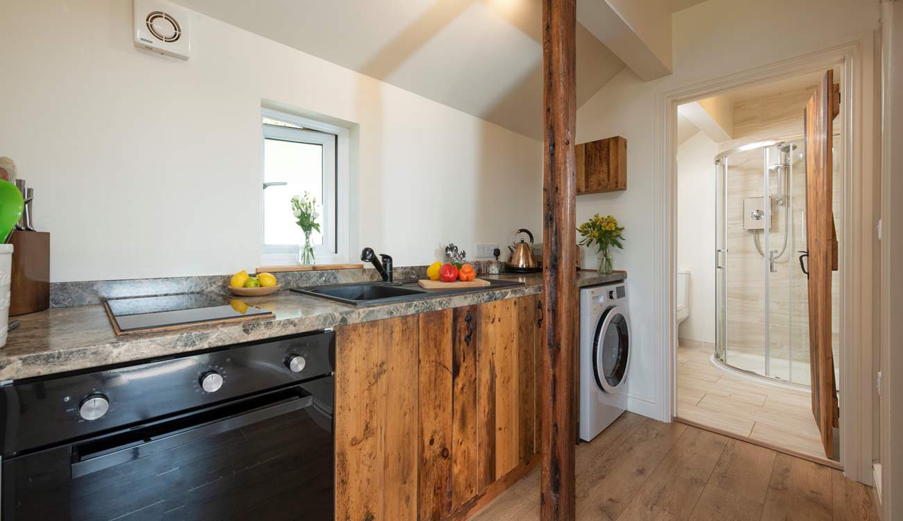 The small kitchen has been thoughtfully designed.