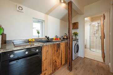 The small kitchen has been thoughtfully designed.