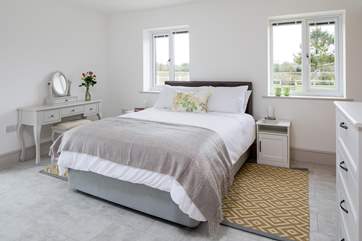 Bedroom 1 is on the ground floor, with a super comfy 5ft king-size bed and en suite shower-room.