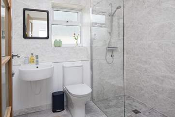The en suite for bedroom 1 has a large walk-in shower.