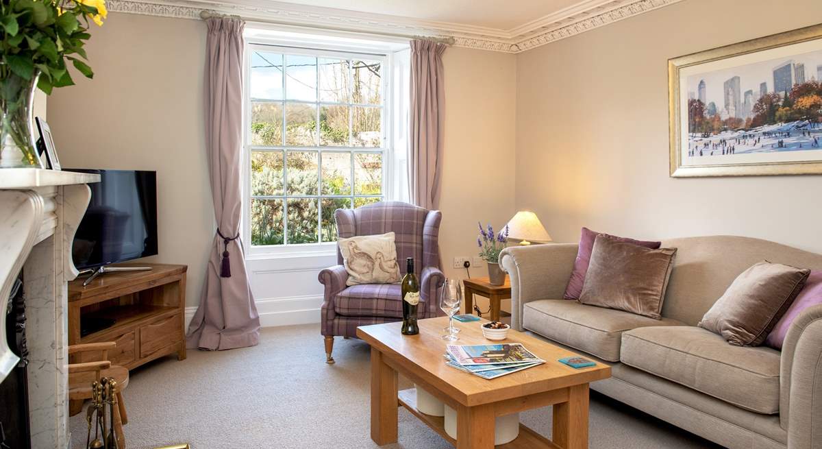 A lovely restful sitting-room in which to unwind and relax.