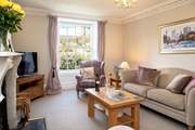 A lovely restful sitting-room in which to unwind and relax.