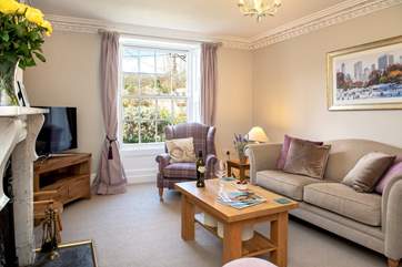 A lovely restful sitting-room in which to unwind and relax.