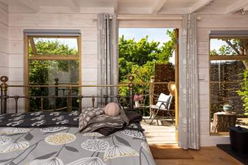 Throw open the doors to the raised deck and let the outside in.