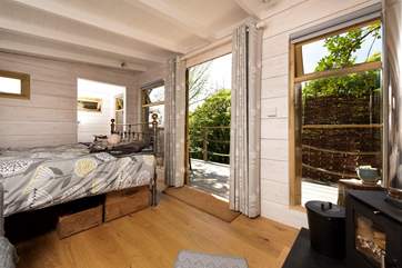 The gorgeous living-room is open plan with everything you could need for a comfortable stay.