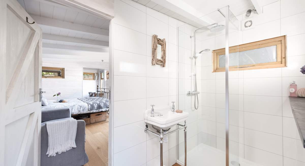 The ensuite shower room is light and airy. 