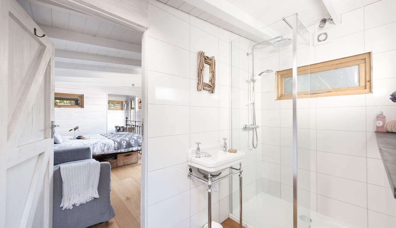 The ensuite shower room is light and airy. 