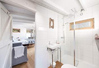 The ensuite shower room is light and airy. 