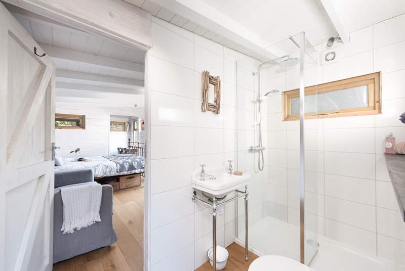 The ensuite shower room is light and airy. 