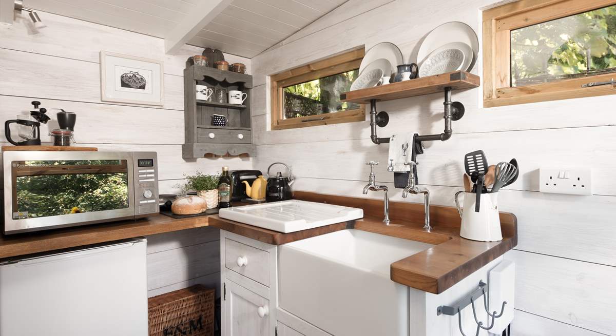 The kitchen is perfectly equipped for your getaway amongst the trees. 