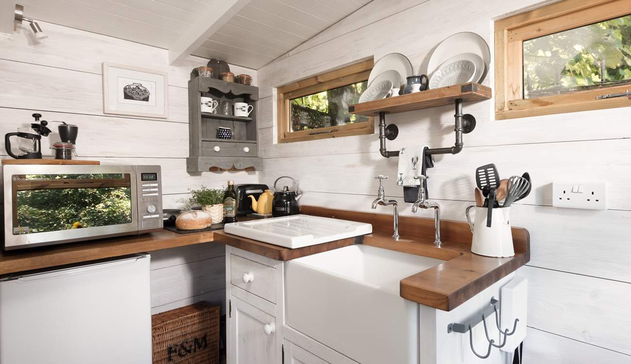 The kitchen is perfectly equipped for your getaway amongst the trees. 