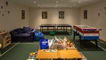 The communal games-room for the younger members of the group is a godsend on a rainy day.