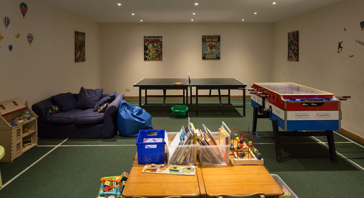 The communal games-room for the younger members of the group is a godsend on a rainy day.