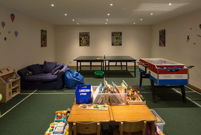 The communal games-room for the younger members of the group is a godsend on a rainy day.