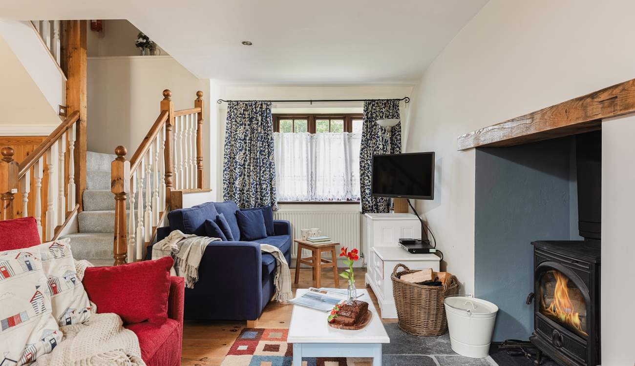 Snuggling up in front of the wood-burner is a must after a day of adventure.