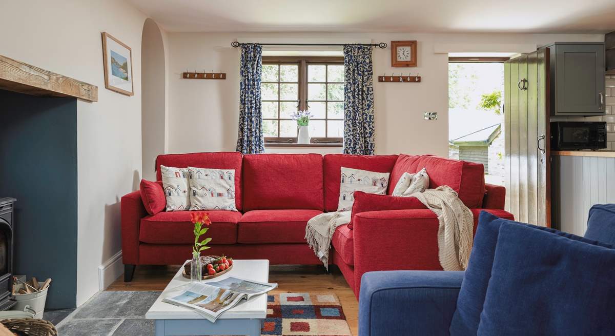 There's plenty of seating for everyone in the cosy living-room.