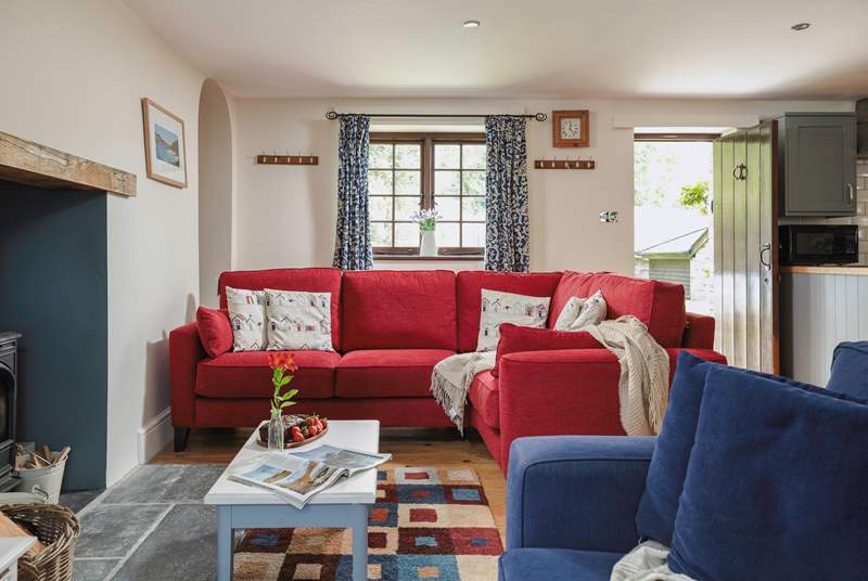 There's plenty of seating for everyone in the cosy living-room.