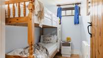 Bedroom 2  is this rather sweet bunk-bed room which is only on offer to the kiddies. Please do note that to access this room you need to go via the utility-room.