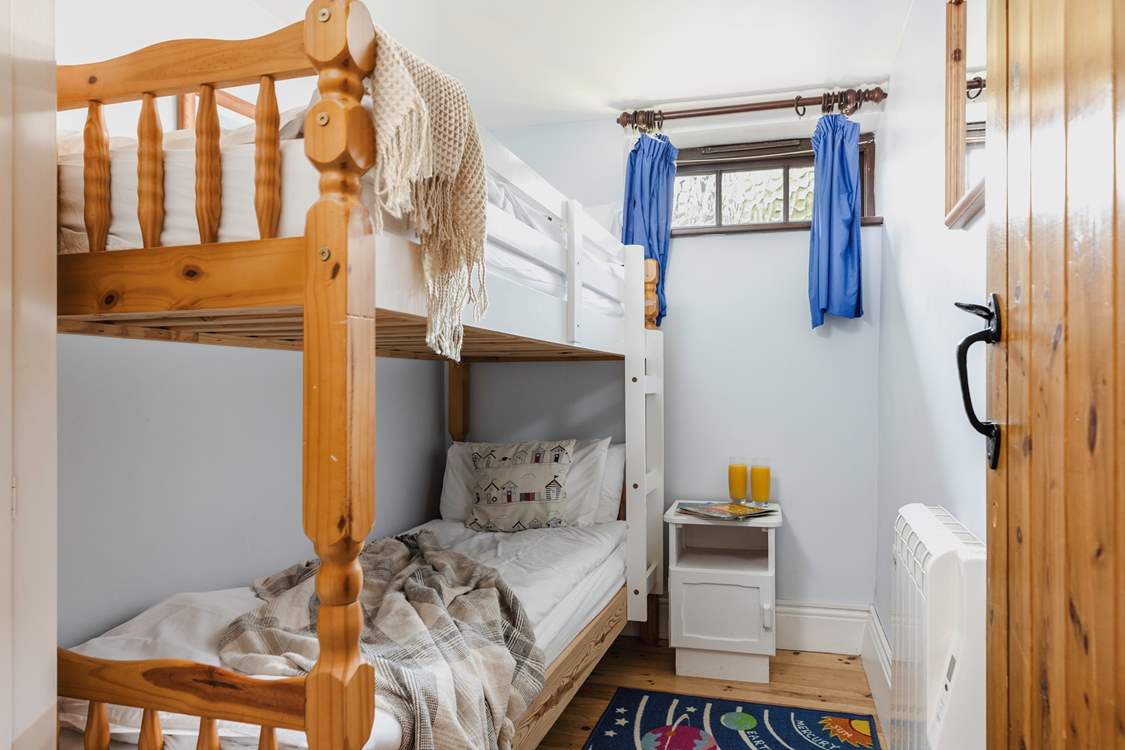 Bedroom 2  is this rather sweet bunk-bed room which is only on offer to the kiddies. Please do note that to access this room you need to go via the utility-room.