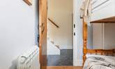 The steps leading down from the living-area into the utility-room which then leads into the bunk room. - Thumbnail Image