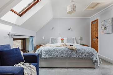 Bedroom 4 is home to this super-king bed. What a fabulous bed to jump into after a long day of entertainment and adventure.