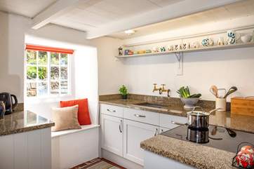 The kitchen is very cute.
