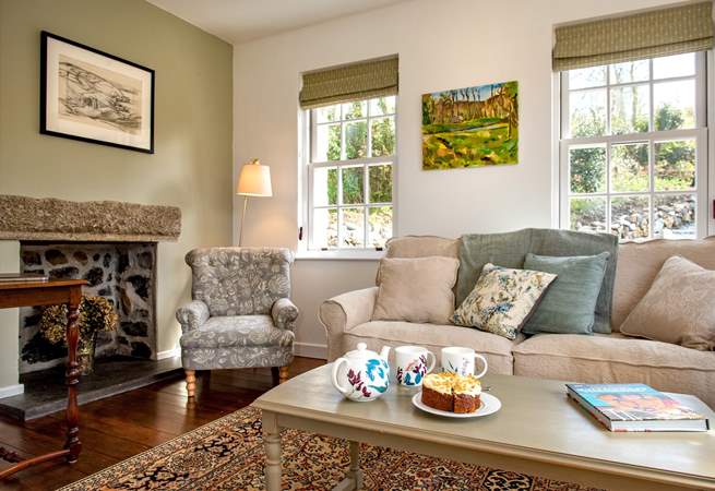 The main sitting-room has a big comfy sofa to chill out on.