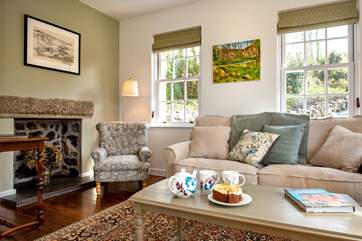The main sitting-room has a big comfy sofa to chill out on.