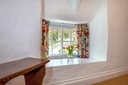The dinky traditional windows are a charming feature.