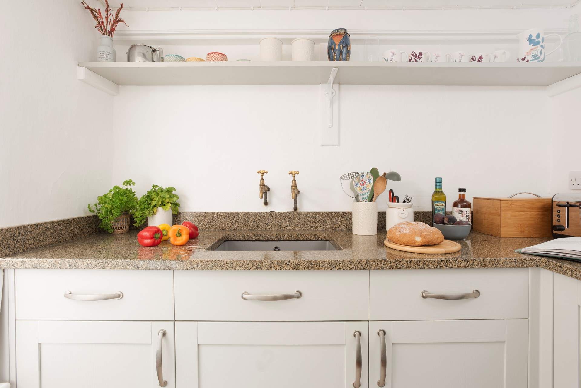The characterful kitchen is ideal for preparing supper.