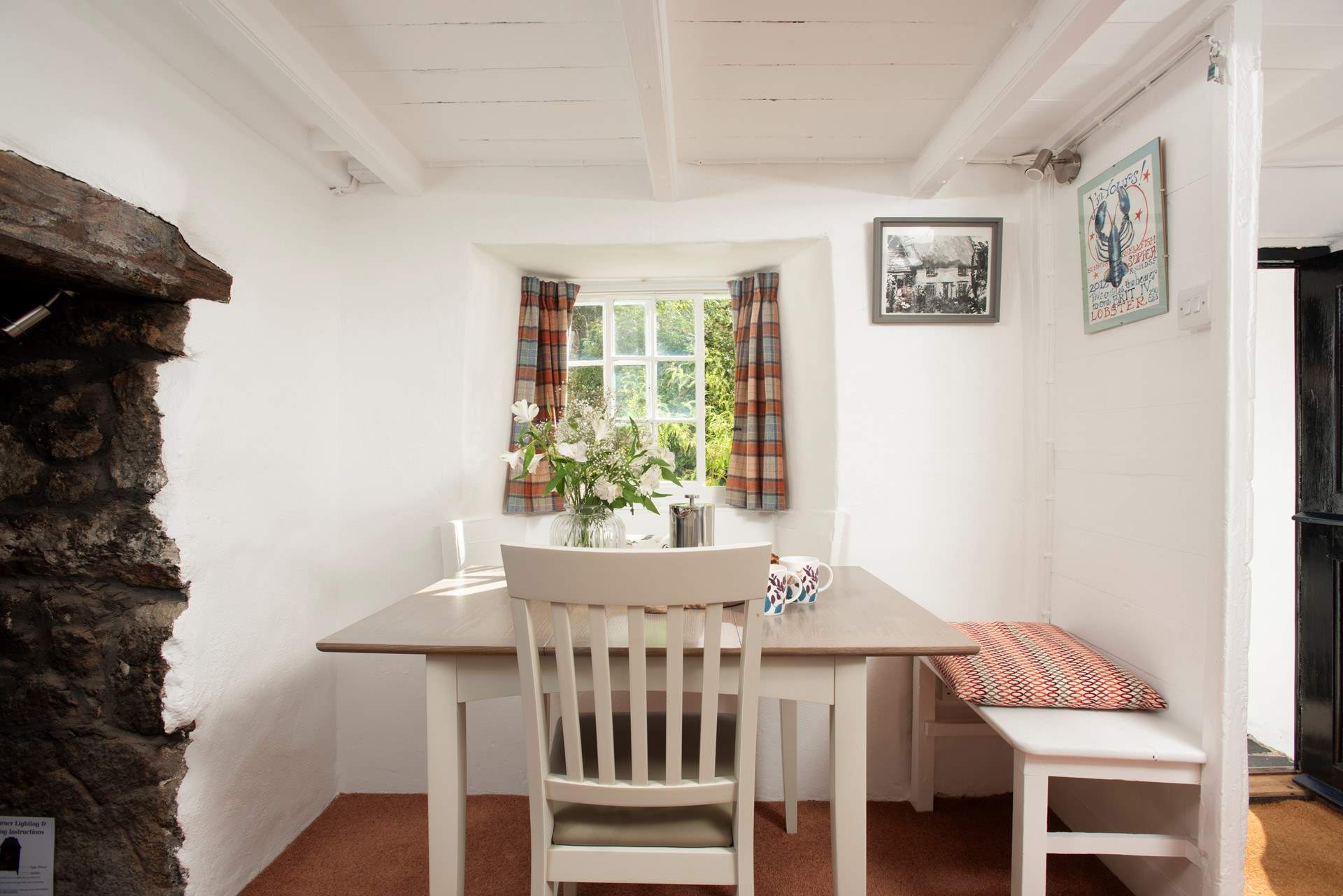 The lovely dining-area is just off the kitchen.
