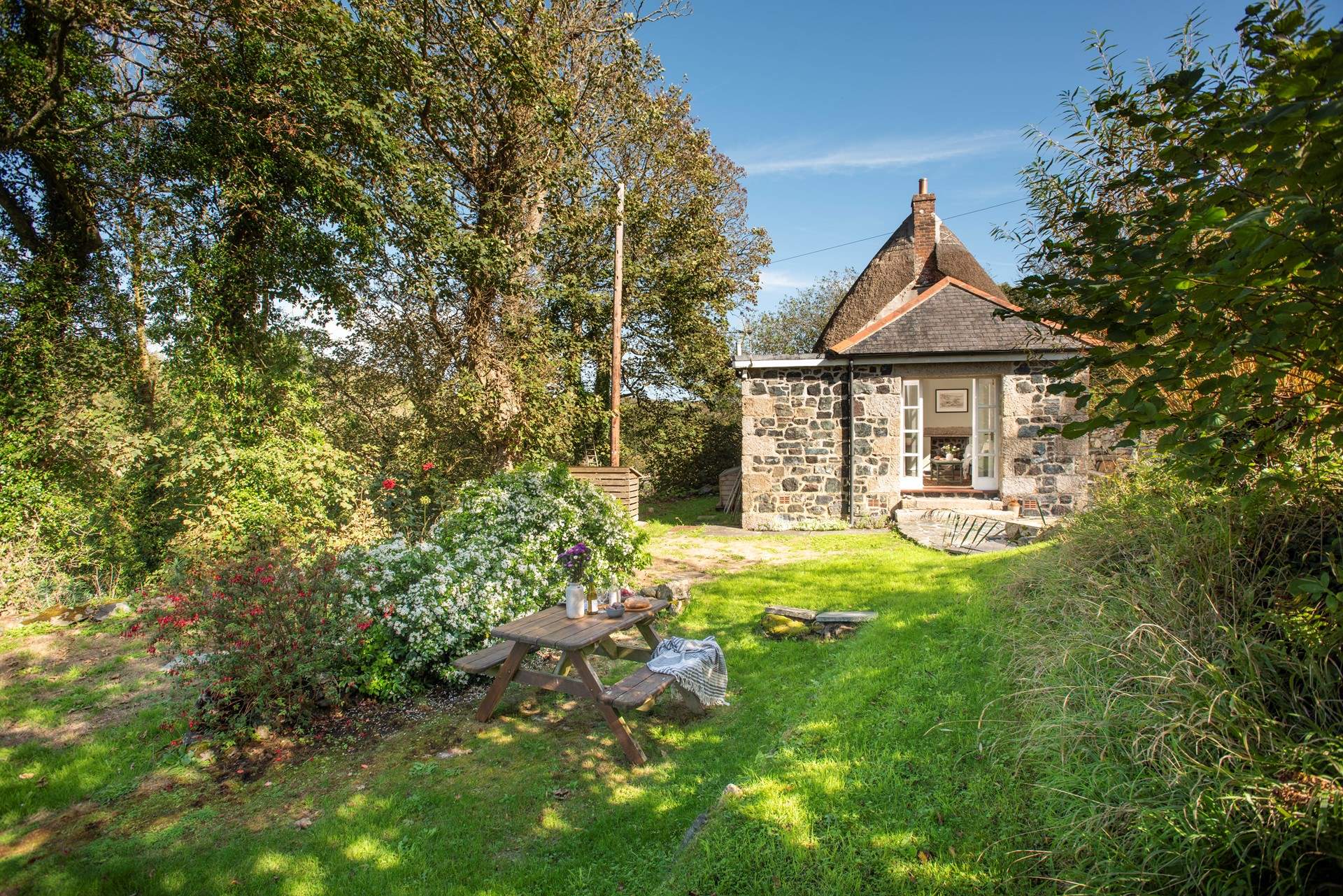 The extension features local serpentine stonework.