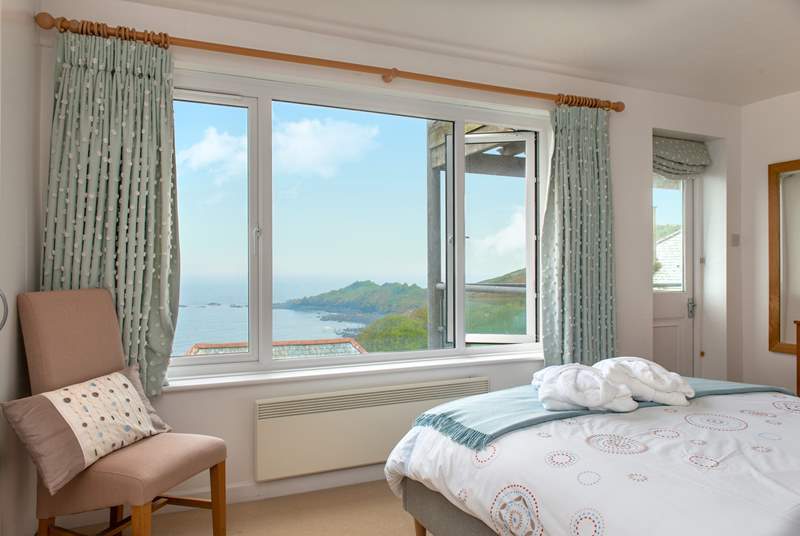 Lie in bed and take in the view,  or perhaps wake up with the sea breeze on your balcony (please note robes are not provided).