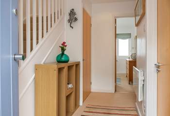 The three bedrooms and family bathroom are on the ground floor and stairs lead up to the open plan living space.