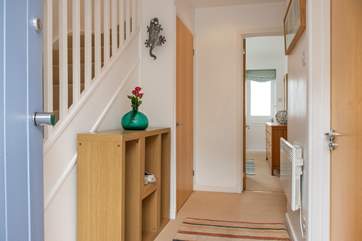 The three bedrooms and family bathroom are on the ground floor and stairs lead up to the open plan living space.