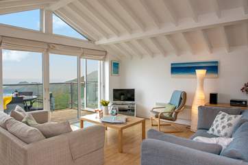 The open plan living space maximises on the view.