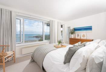 Bedroom 1 has a stunning ocean view and access to the bottom deck.
