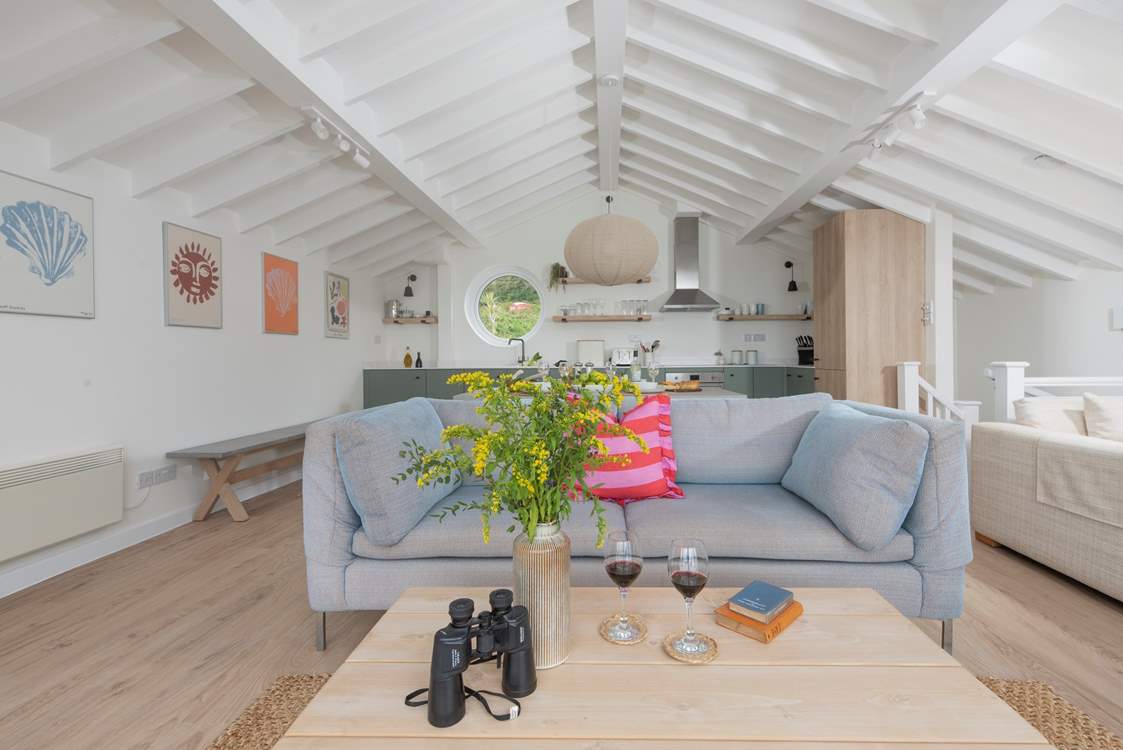 A comfy lounge space to look out over the stunning sea view.