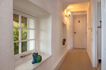 This traditional cottage has a few steps up and down.