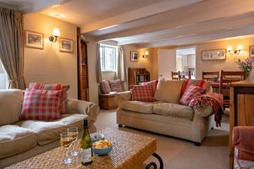 Enjoy relaxing on the sofas with a glass of wine.