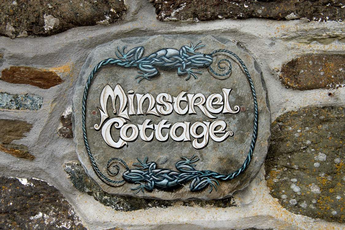 A local artist has painted this pretty sign.