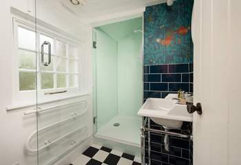 The family shower room is ideal for a refreshing shower after a busy beach day.