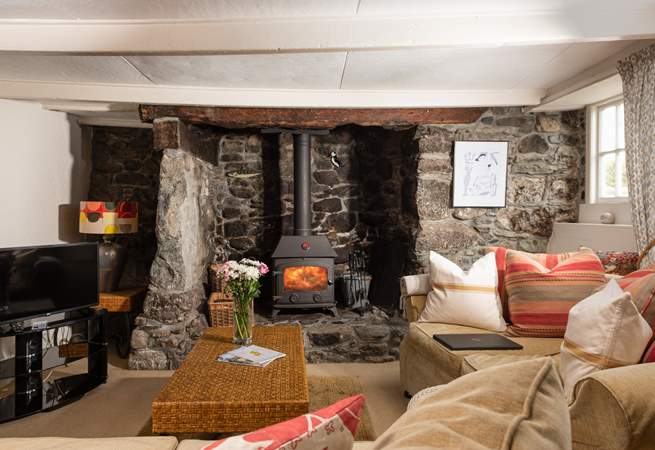 There is a stunning inglenook fireplace to keep you toasty.